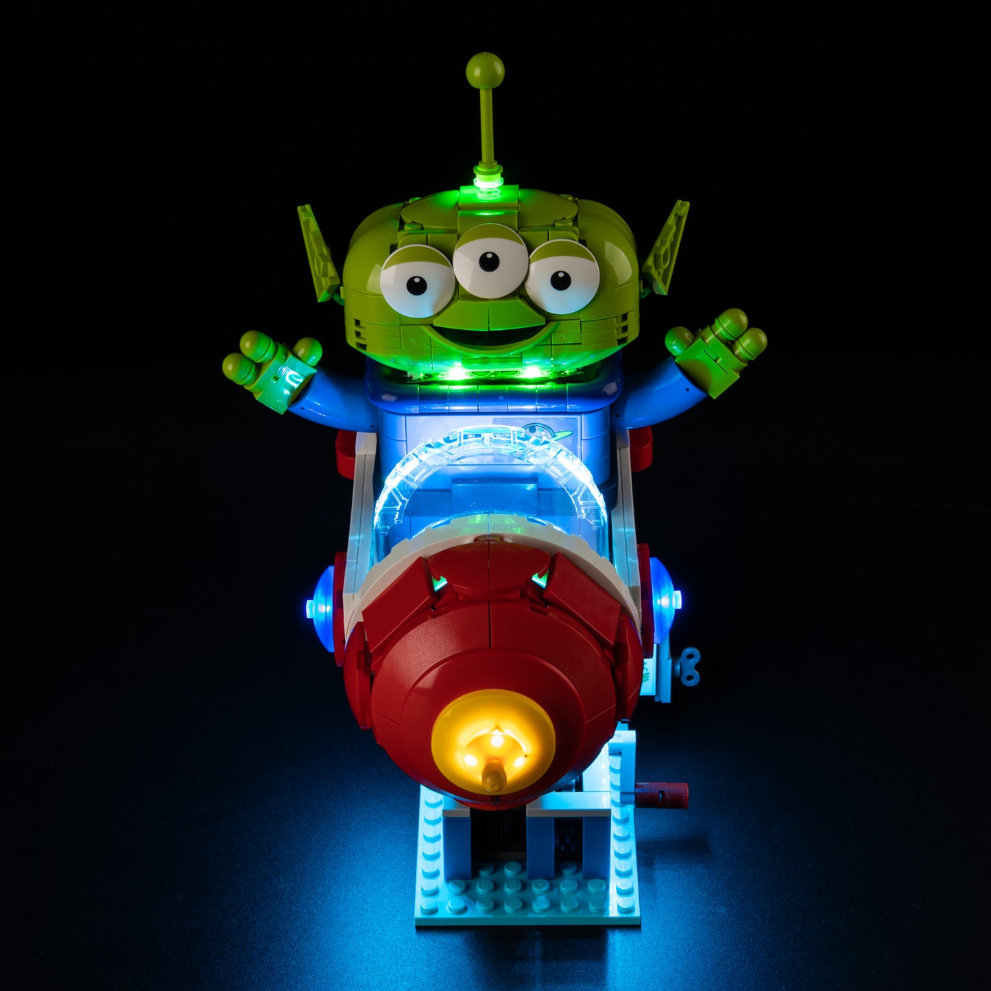 Front view of the assembled Alien with Pizza Planet Rocket Ride LEGO lighting