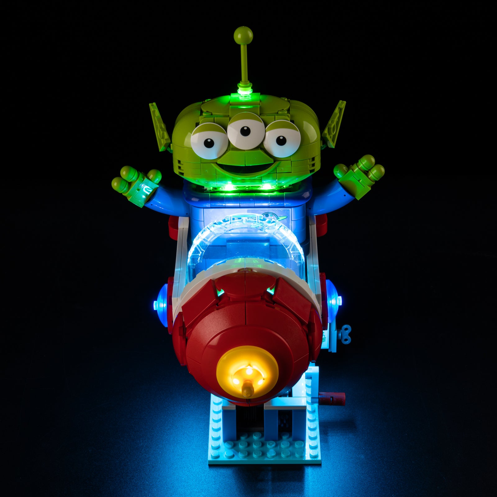 Front view of the assembled Alien with Pizza Planet Rocket Ride LEGO lighting