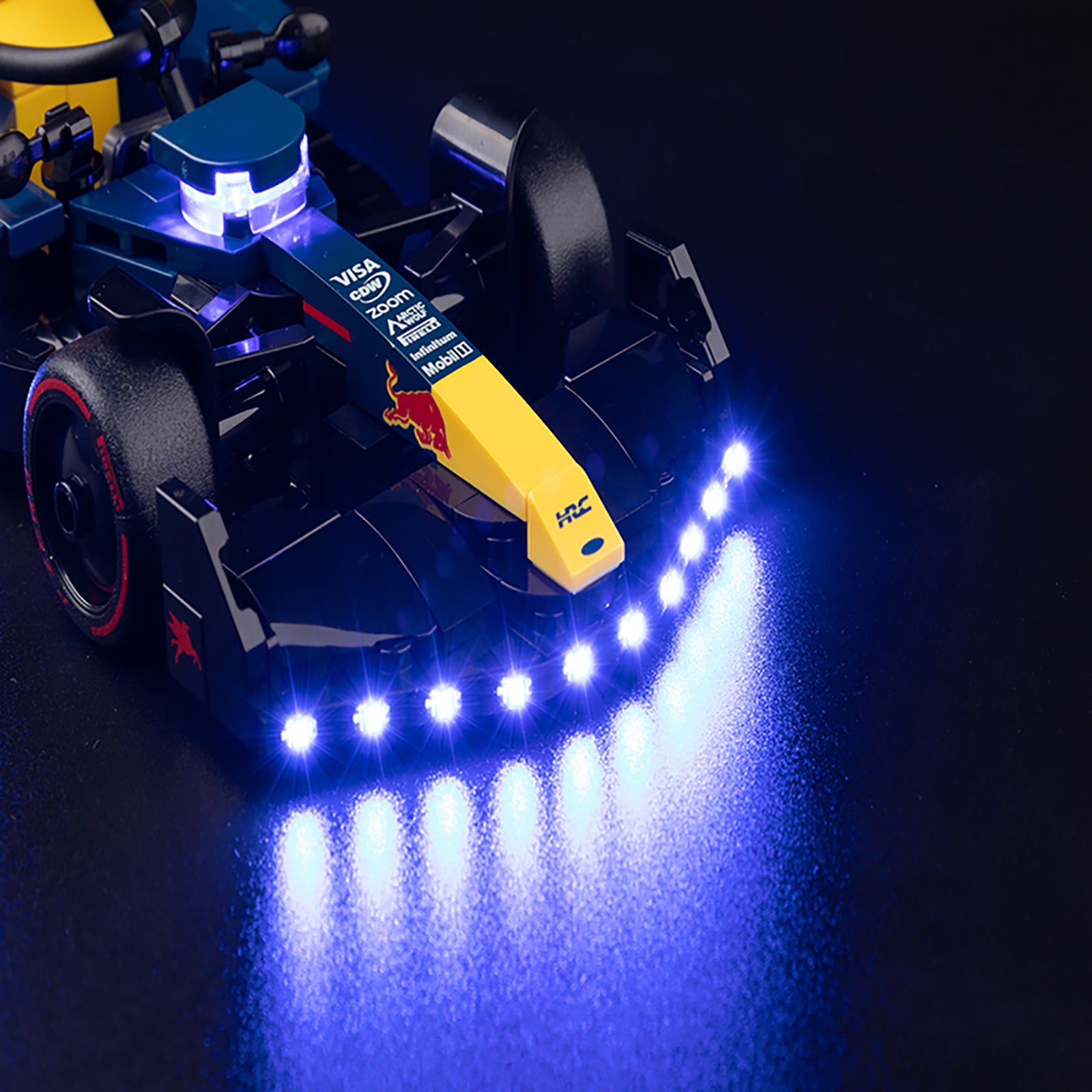 77243 77243 - close-up of headlight and front detail
